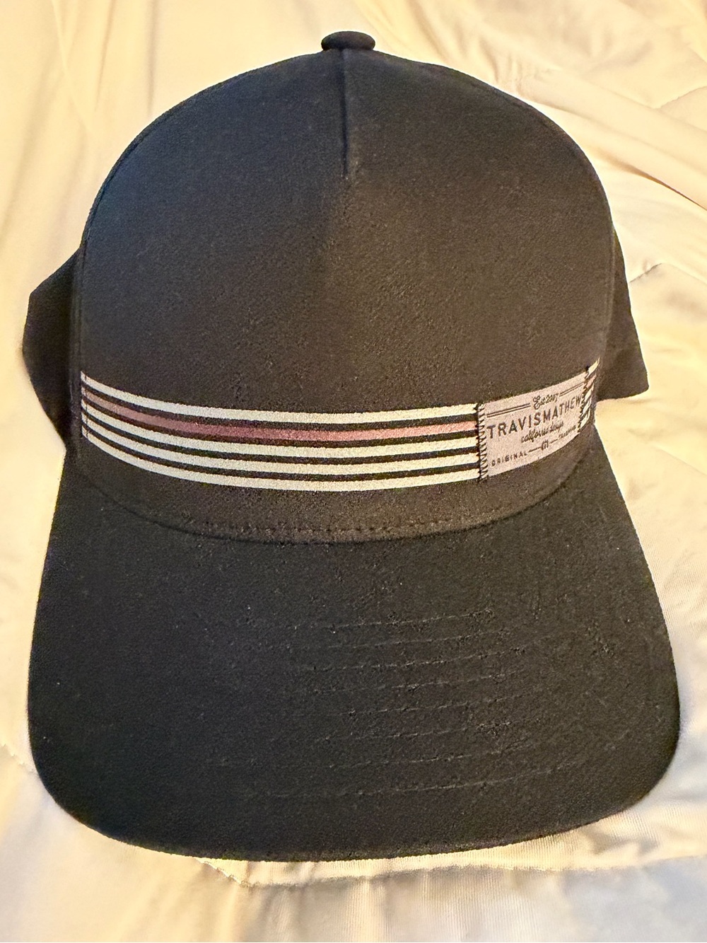 Travis Mathew Men’s Black Stripe Baseball Cap